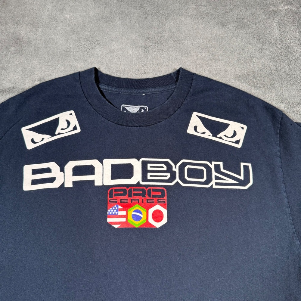 Bad Boy Pro Series MMA T-Shirt Mens Large Navy Blue Eyes Flags Graphic Tee